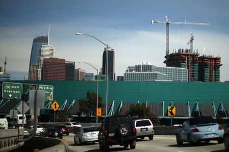 Construction cranes are seen in downtown Los Angeles, California, U.S., March 7, 2017. REUTERS/Lucy Nicholson