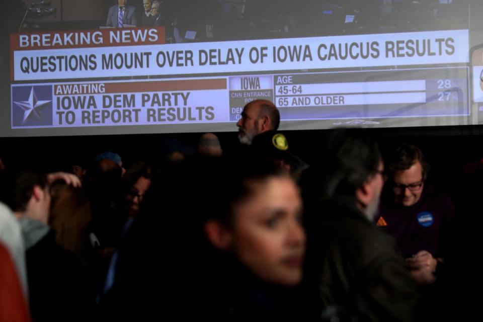 Supporters of democratic presidential candidate Sen. Bernie Sanders (I-VT) wait for results to come in at his caucus night watch party on February 03, 2020 in Des Moines, Iowa (Getty Images)