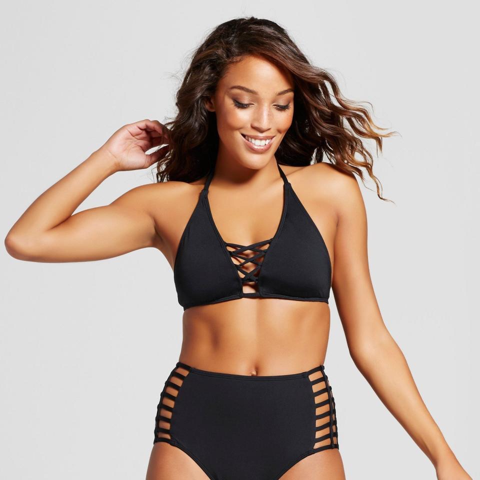 Get the top <a href="https://www.target.com/p/women-s-strappy-high-neck-halter-bikini-top-mossimo-153/-/A-52692746#lnk=sametab" target="_blank">here</a>, $19.99.