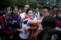 Sudarat Keyuraphan, (C) Pheu Thai Party and Prime Minister candidate greets her supporters during an election campaign in Ubon Ratchathani Province, Thailand, February 18, 2019. REUTERS/Athit Perawongmetha