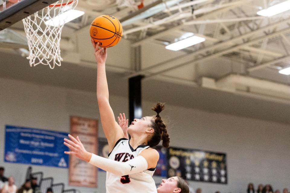 West Panthers guard Kylee Falatea (3) jumps for a layup during a game against the Salem Hills Skyhawks at West High School in Salt Lake City on Thursday, Feb. 22, 2024. | Marielle Scott, Deseret News