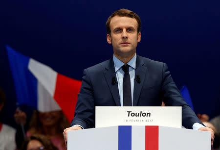 Emmanuel Macron, head of the political movement En Marche !, or Forward !, and candidate for the 2017 French presidential election, attends a political rally in Toulon, France February 18, 2017. REUTERS/Jean-Paul Pelissier