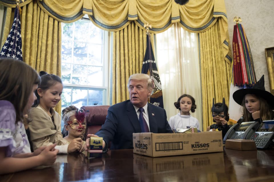 Donald Trump told a little girl she could take chocolate because she didn't have 'a weight problem'. Source: Getty