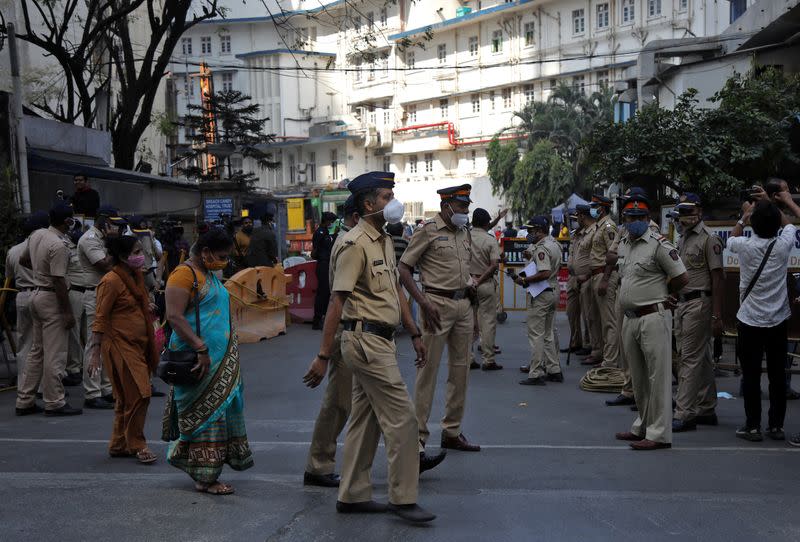 Police stand guard outside the Breach Candy Hospital after the death of singer Lata Mangeshkar in Mumbai