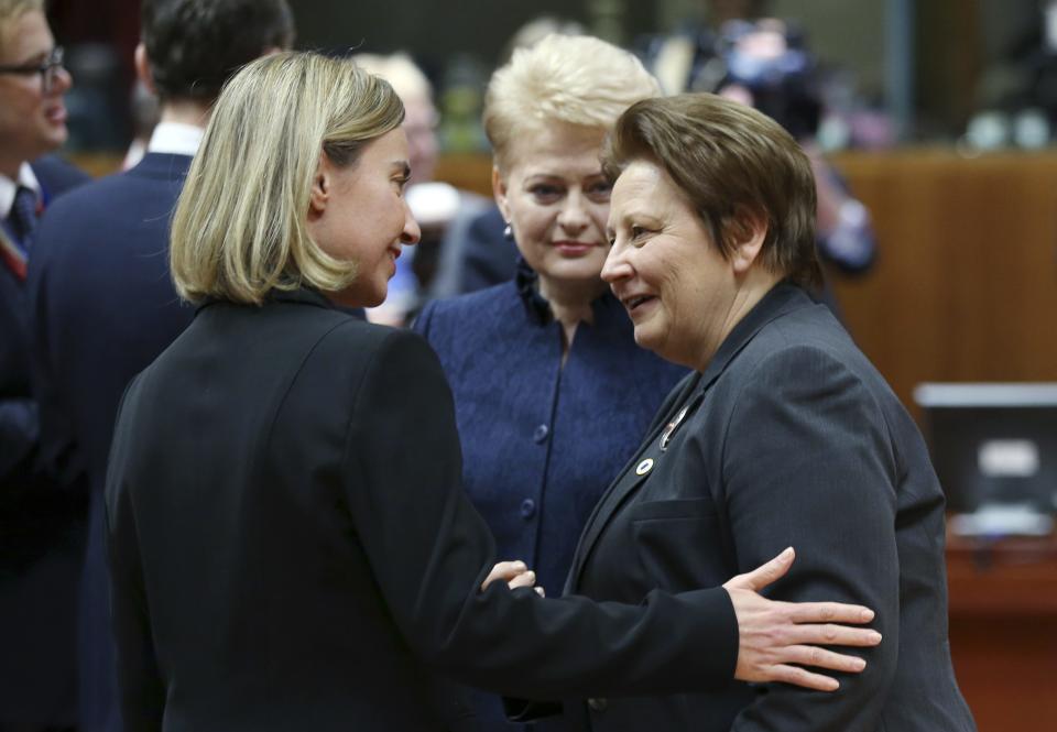 (L-R) European Union foreign policy chief Federica Mogherini, Lithuania's President Dalia Grybauskaite and Latvia's Prime Minister Laimdota Straujuma attend a European Union leaders summit in Brussels December 18, 2014. EU leaders gathered in Brussels on Thursday seeking common ground on a long-term strategy to deal with an unfriendly but economically wounded Russia. REUTERS/Francois Lenoir (BELGIUM - Tags: BUSINESS POLITICS)