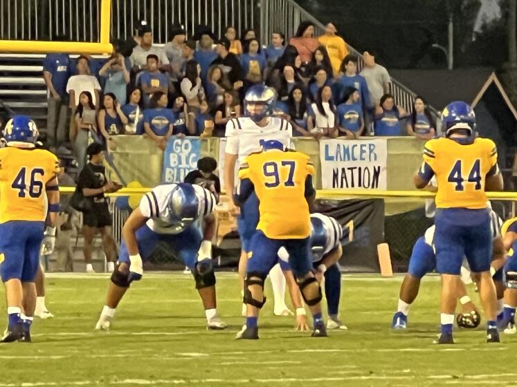 6-foot-7 Orange Lutheran transfer QB John Gazzaniga looking over the field for Santa Margarita.