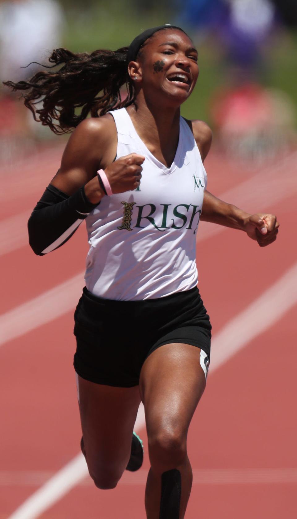 St. Vincent-St. Mary's Kya Epps sets a new state record with a time of 11.57 and a championship in the 100 meter dash at the Div. II state track and field championships at Jesse Owen Stadium in Columbus on Saturday.