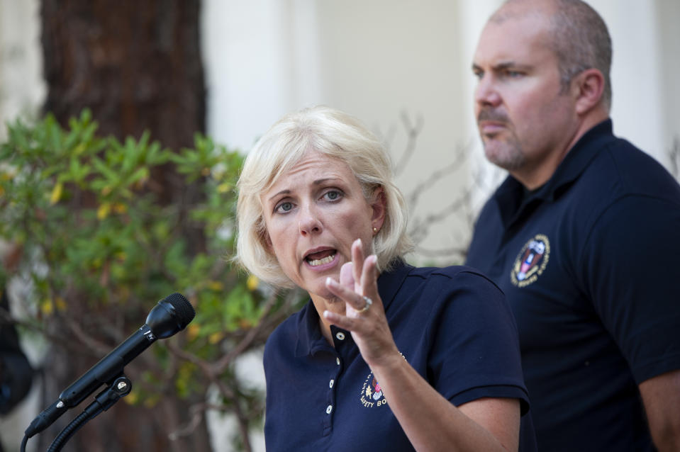 National Transportation Safety Board (NTSB) member Jennifer Homendi, left, with NTSB Investigator-in-charge, Adam Tucker, speaks at a news conference in Santa Barbara, Calif., Tuesday, Sept. 3, 2019. Homendi discussed the ongoing investigation of how the Conception diving boat became engulfed in flames and killed dozens on board. (AP Photo/Christian Monterrosa)