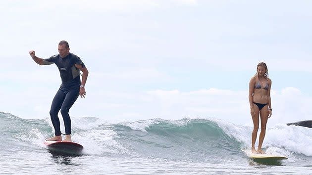 Tony Abbott snaked Ivy Thomas's wave in Noosa during the Easter long weekend. Photo: Instagram/Bailey Eldering/Ivy Thomas