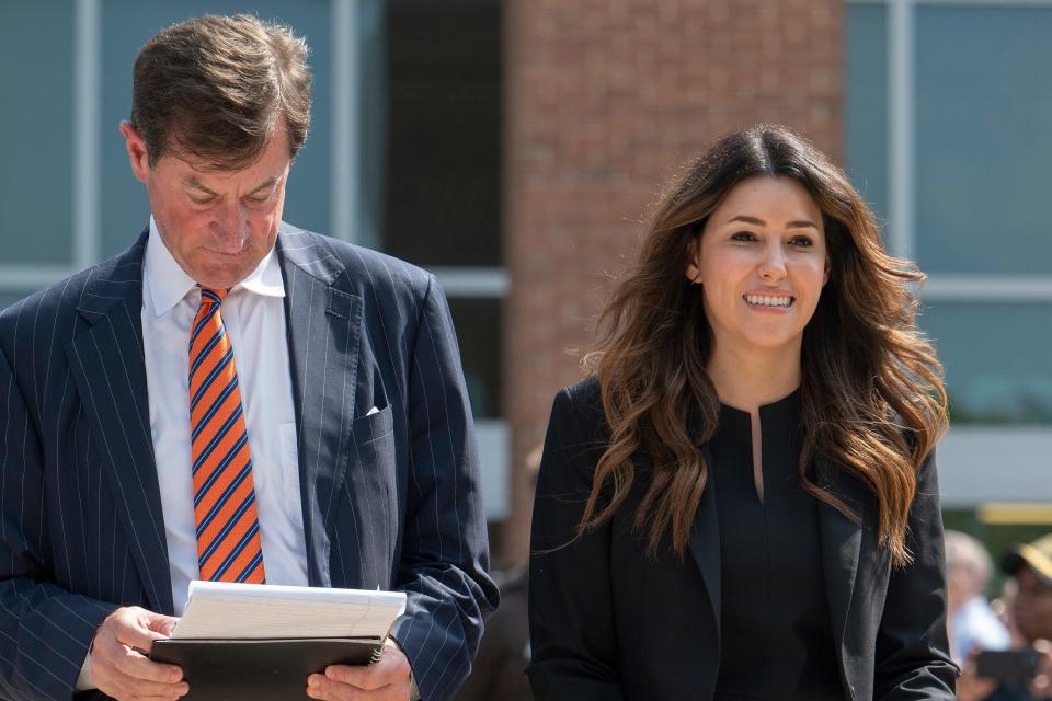 Camille Vasquez and Ben Chew give statements outside of Fairfax County Courthouse on June 1 after a jury awarded Johnny Depp more than $10 million in his libel lawsuit against ex-wife Amber Heard. The jury also found Heard was defamed and awarded her $2 million in damages.