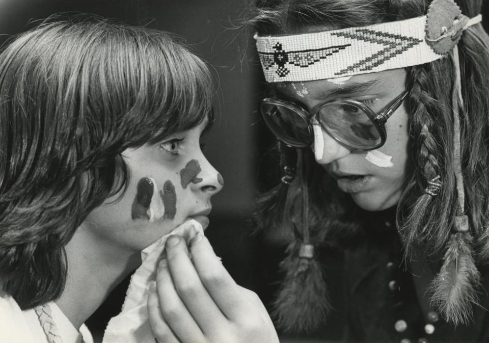 1981 - Black and white file photo - Vicki Dougherty, left, of Toledo, learned about Native Americans at COSI. Volunteer Judy Baumgardner, 13, of Worthington, helped Vicki remove face paint during a workshop.