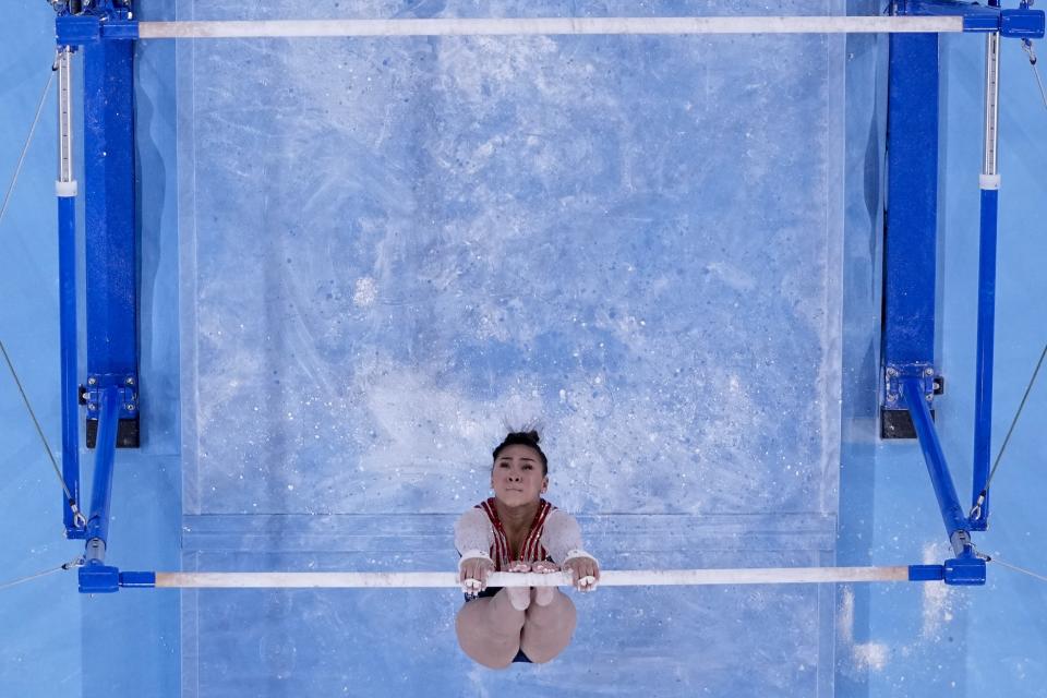 Sunisa Lee, of the United States, performs on the uneven bars during the artistic gymnastics women's all-around final at the 2020 Summer Olympics, Thursday, July 29, 2021, in Tokyo. (AP Photo/Morry Gash)