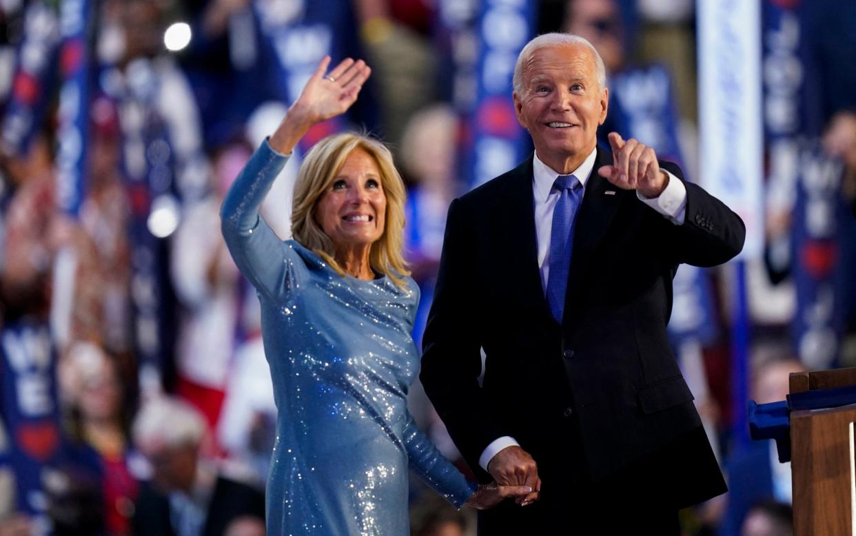 Joe and Jill Biden wave as his speech concludes