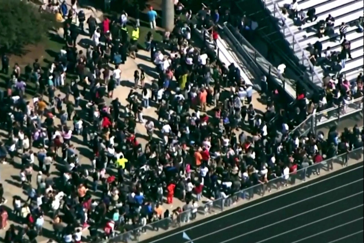 4 dead, suspect in custody after students evacuated from school near Atlanta