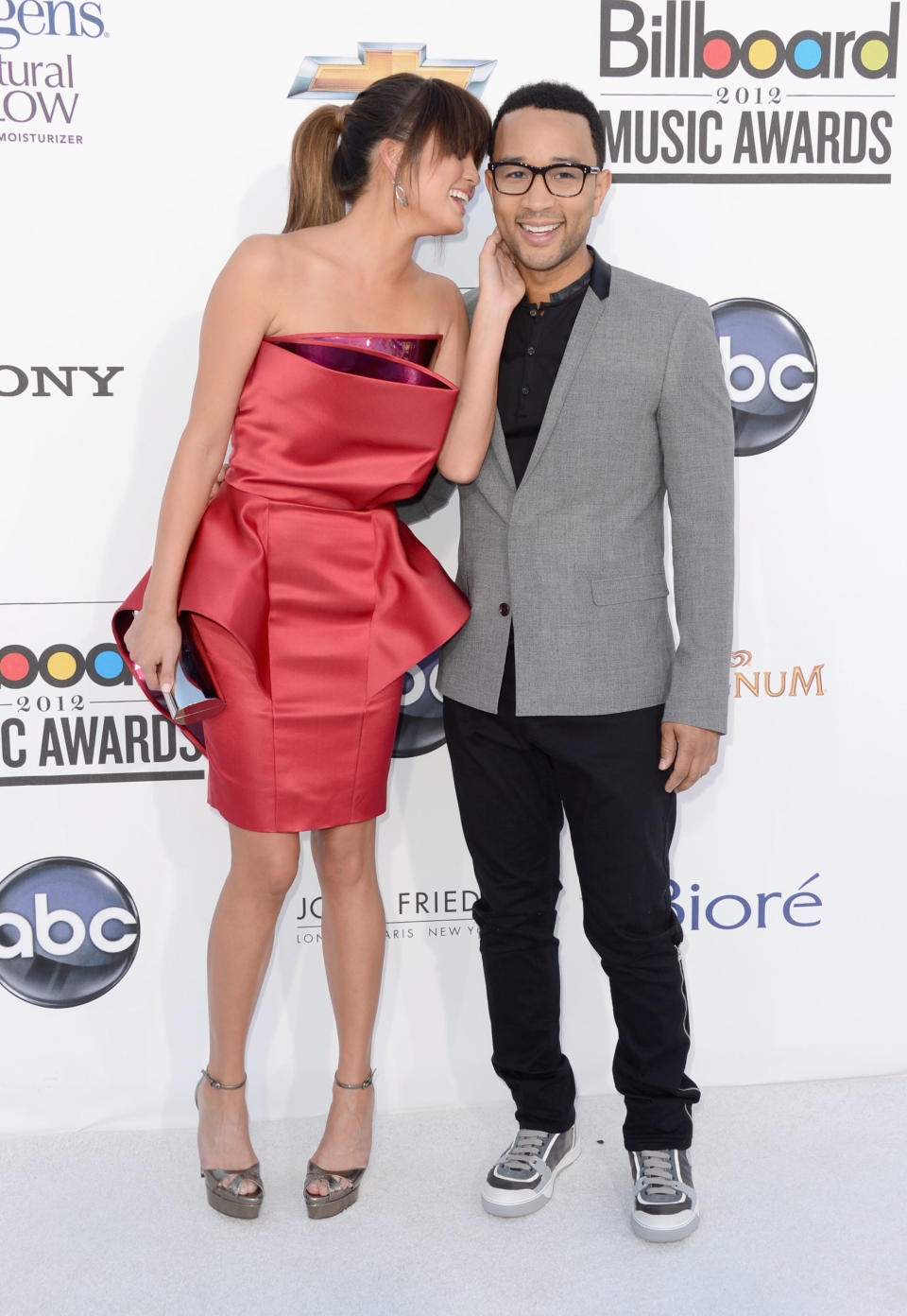 LAS VEGAS, NV - MAY 20: Model Chrissy Teigen and musician John Legend arrives at the 2012 Billboard Music Awards held at the MGM Grand Garden Arena on May 20, 2012 in Las Vegas, Nevada. (Photo by Frazer Harrison/Getty Images for ABC)