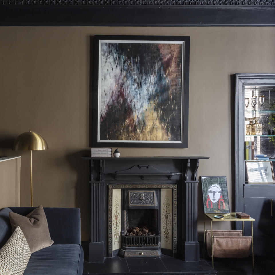 brown living room with fireplace