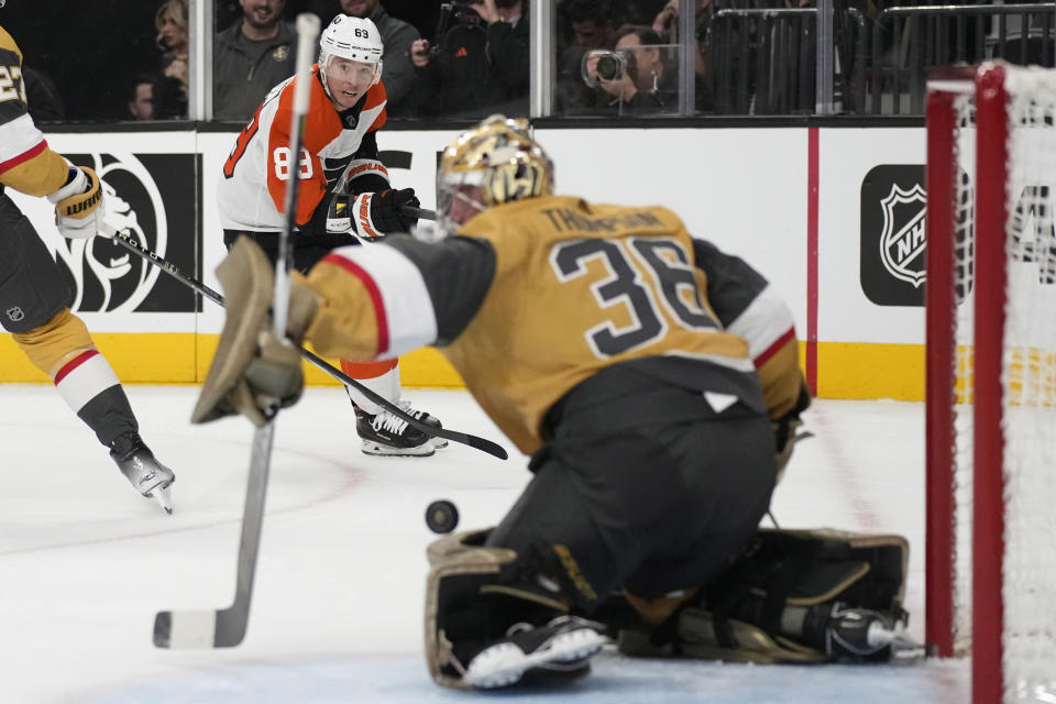 Philadelphia Flyers right wing Cam Atkinson (89) scores against Vegas Golden Knights goaltender Logan Thompson (36) during the first period of an NHL hockey game Tuesday, Oct. 24, 2023, in Las Vegas. (AP Photo/John Locher)