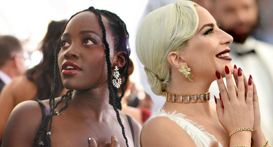 Lupita Nyong’o and Lady Gaga both sporting oxblood makeup at the 2019 SAG Awards. (Photos: Getty Images)