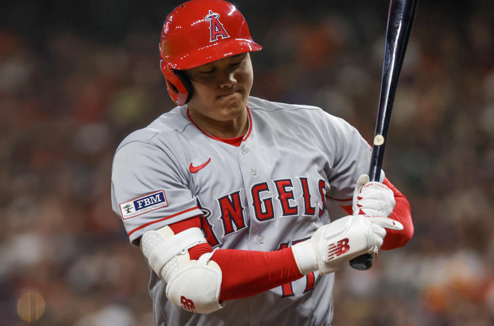 Aug 11, 2023; Houston, Texas, USA; Los Angeles Angels designated hitter Shohei Ohtani (17) reacts to striking out against the Houston Astros in the eighth inning at Minute Maid Park. Mandatory Credit: Thomas Shea-USA TODAY Sports