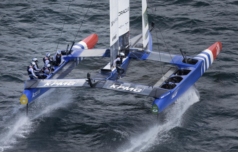 In this photo provided by SailGP, France SailGP Team helmed by Quentin Delapierre competes during race 1 of the Australia Sail Grand Prix in Sydney, Australia, Saturday Feb. 18, 2023. (Simon Bruty/SailGP via AP)