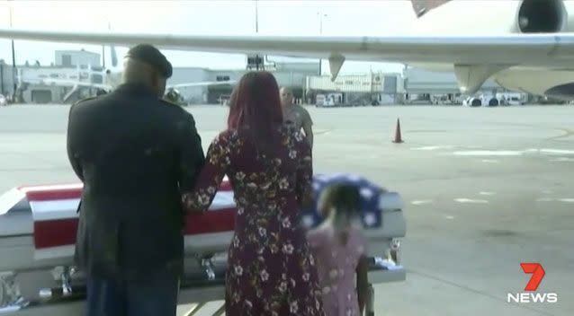 Johnson's wife awaited his body as it returned to the US. Source: 7 News