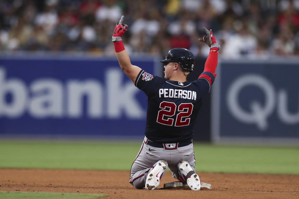 Atlanta Braves' Joc Pederson reacts after hitting an RBI double in the sixth inning of a baseball game against the San Diego Padres, Saturday, Sept. 25, 2021, in San Diego. (AP Photo/Derrick Tuskan)