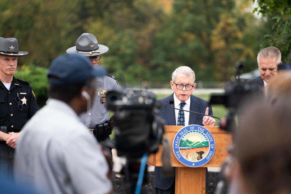 Gov. Mike DeWine speaks about the distracted driving law that will be enforced starting today, during a press conference along I-71 at Tanger Outlet Mall.