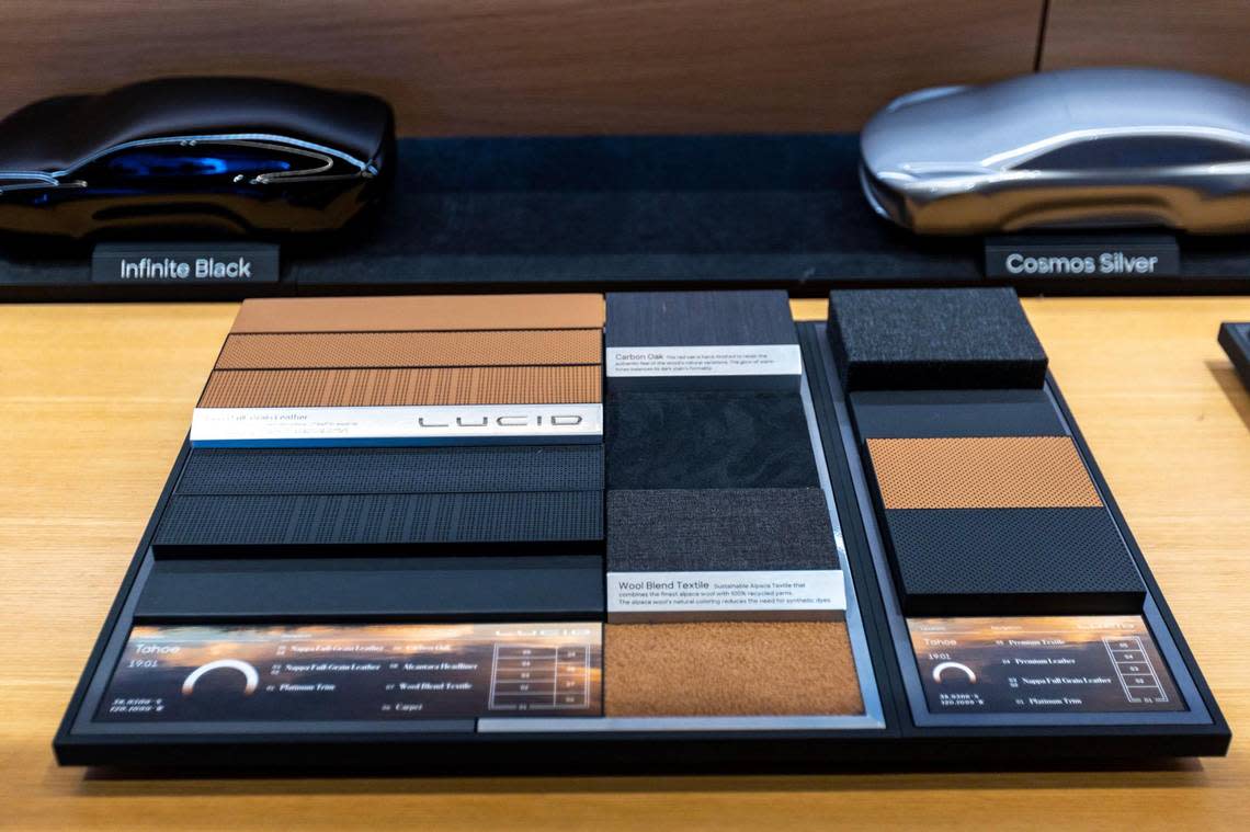 Swatches displaying interior fabrics for a Lucid EV at the Brickell Studio showroom for Lucid, a new high-end electric car company, within Brickell City Centre in Miami, Florida, on Friday, December 2, 2022.