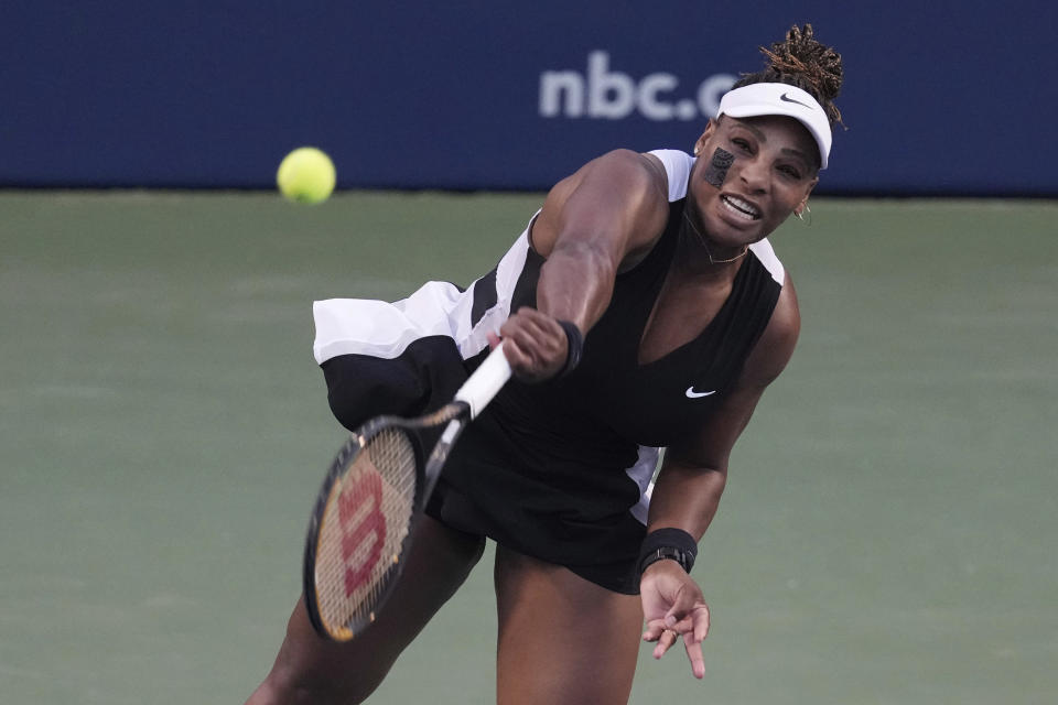 Serena Williams, of the United States, serves to Belinda Bencic, of Switzerland, during the National Bank Open tennis tournament Wednesday, Aug. 10, 2022, in Toronto. (Chris Young/The Canadian Press via AP)