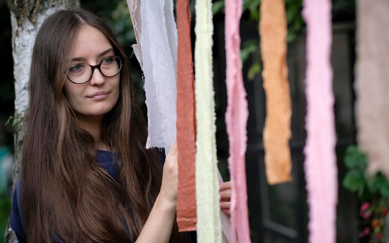 Artist Abigail Booth doesn’t buy natural dyes, she makes her own from raw materials. Boudicca Fox-Leonard helps out - Christopher Pledger