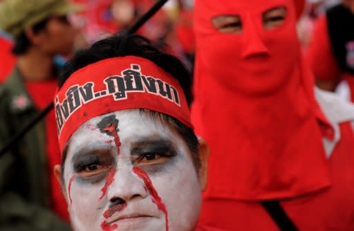 Thai anti-government 'Red Shirt' protesters take part in a rally at Democracy Monument in downtown Bangkok on March 12. Thai Prime Minister Abhisit Vejjajiva survived a no-confidence motion brought by opposition lawmakers seeking to inflict damage ahead of upcoming elections