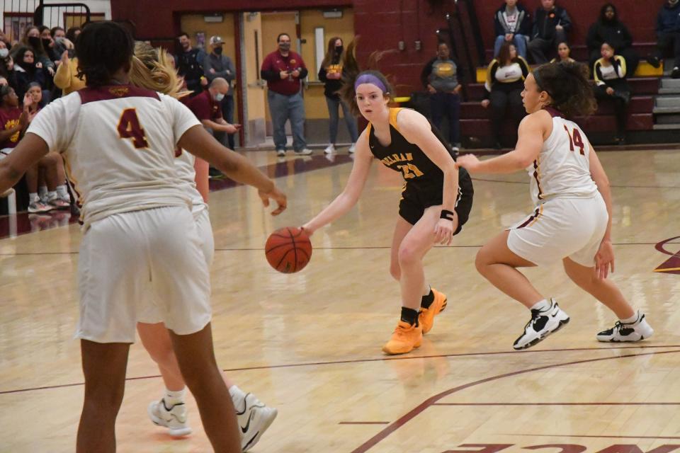 Delran's Riley Ahrens drives to the basket during a game last season. The senior is one of 10 finalists for a national courage award for her off-the-court contributions.