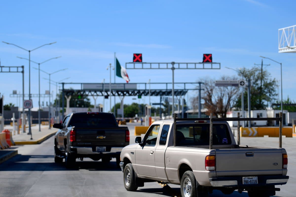 Cars wait in line to cross the border during the reopening of the Ciudad Acuna, Coahuila - Del Rio, Texas, US, international bridge in September 2021  (AFP via Getty Images)