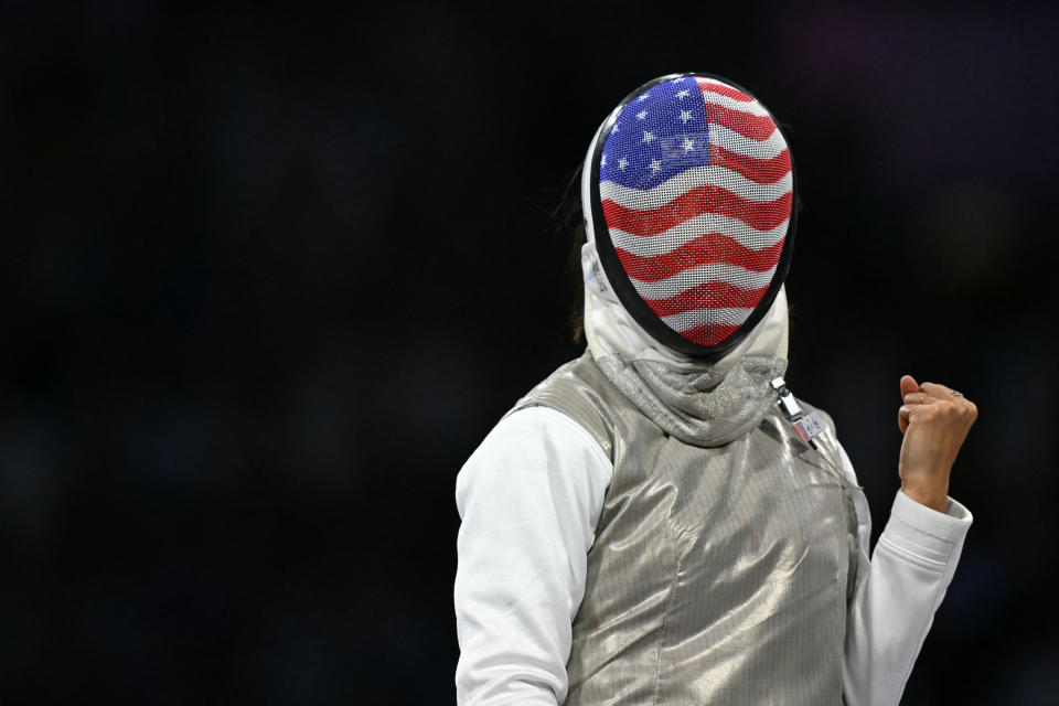 US' Lee Kiefer reacts as she competes in the women's foil team gold medal bout between Italy and USA during the Paris 2024 Olympic Games at the Grand Palais in Paris, on August 1, 2024. (Photo by Fabrice COFFRINI / AFP) (Photo by FABRICE COFFRINI/AFP via Getty Images)