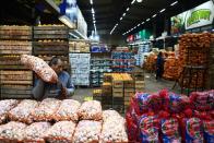 Argentines face daily race for deals as inflation soars above 100% in Buenos Aires, Argentina