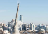 The unfinished and abandoned TV tower collapses during a controlled demolition in Yekaterinburg, Russia March 24, 2018. REUTERS/Alexei Kolchin