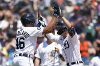 Detroit Tigers first baseman Spencer Torkelson, right, celebrates his two-run home run with Jeimer Candelario (46) in the fifth inning of a baseball game against the Kansas City Royals in Detroit, Sunday, July 3, 2022. (AP Photo/Paul Sancya)