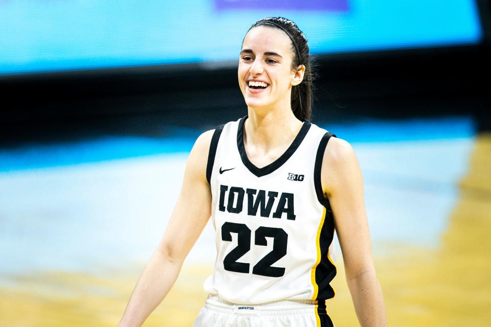 Iowa guard Caitlin Clark smiles during a NCAA Big Ten Conference women's basketball game against Indiana, Sunday, Feb. 26, 2023, at Carver-Hawkeye Arena in Iowa City, Iowa.