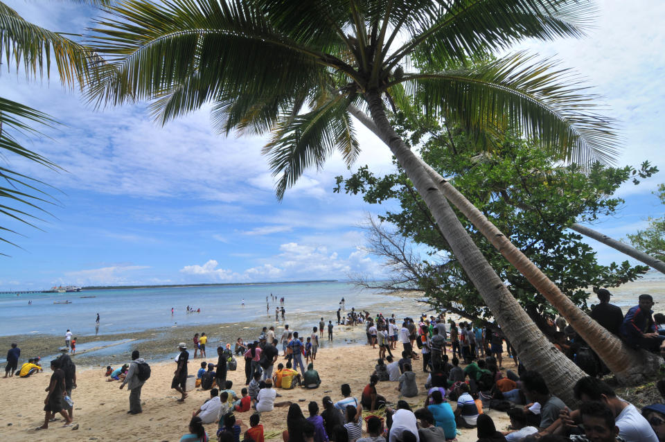 INTATA ISLAND, TALAUD, NORTH SULAWESI, INDONESIA - 2015/05/17: People unite in a traditional ceremony called 