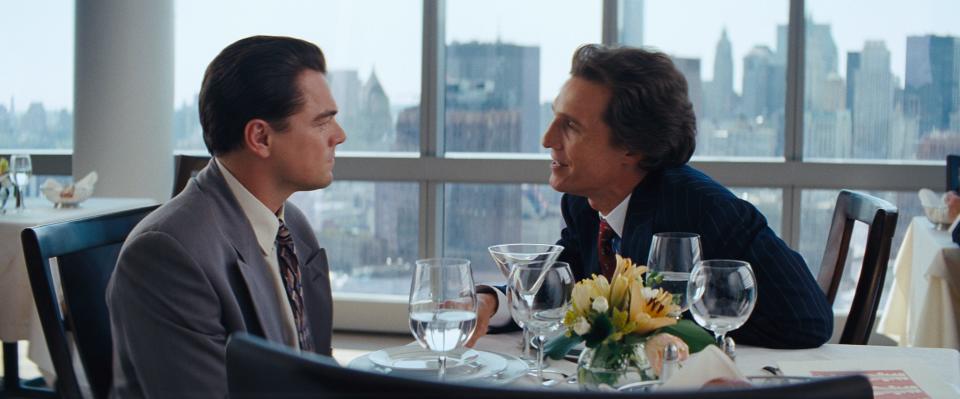 Jordan Belfort (Leonardo DiCaprio, left) gets some morally questionable career advice from Mark Hanna (Matthew McConaughey) in "The Wolf of Wall Street."