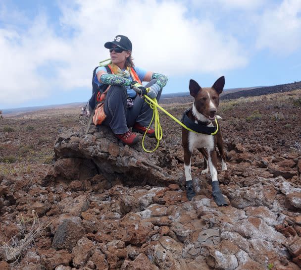 PHOTO: Dr. Michelle Reynolds and Slater in Hawaii Volcanoes National Park. (National Parks Service)