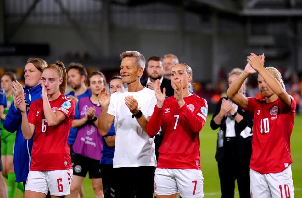 Denmark head coach Lars Sondergaard and his players applaud the fans after their defeat to Spain (John Walton/PA). (PA Wire)