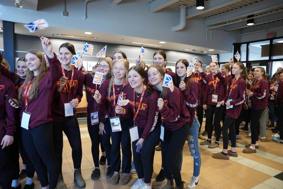 Some of the Central region's female athletes await to enter the closing ceremonies of the 2024 N.L. Winter Games.