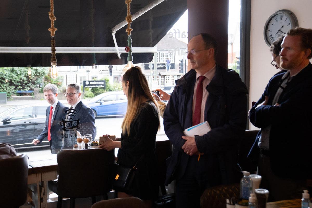 Labour Party leader Sir Keir Starmer arrives at the Oak Caffe in Barnet, north London with parliamentary candidate for Chipping Barnet, Dan Tomlinson where they chatted with swing voters and local business owners whilst campaigning for this year’s <i>(Image: PA)</i>