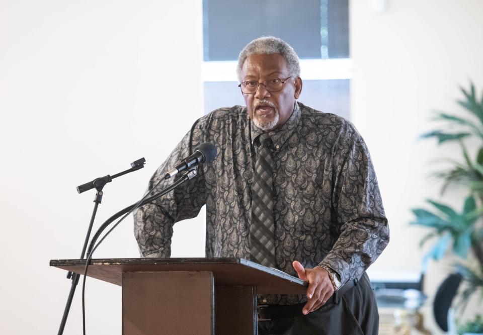 Calvin Avant says an opening prayer during the Epps Christian Center / EComfort Stand Against Hunger luncheon in Pensacola on Wednesday, Sept. 28, 2022.