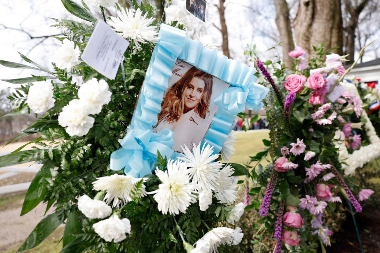 MEMPHIS, TENNESSEE - JANUARY 22: A view of fan tributes outside of Graceland at the public memorial for Lisa Marie Presley on January 22, 2023 in Memphis, Tennessee. Presley, 54, the only child of American singer Elvis Presley, died January 12, 2023 in Los Angeles. (Photo by Jason Kempin/Getty Images)