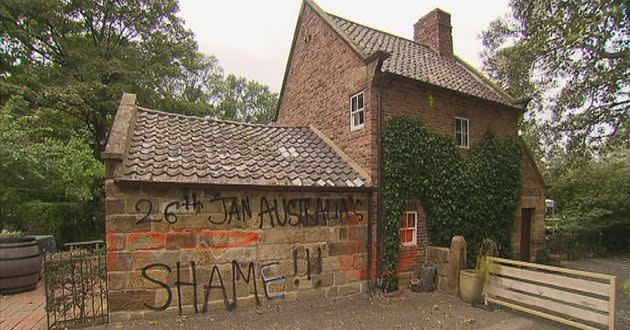 Police hunt vandals who sprayed anti-Australian slogans on historic Captain Cook's cottage overnight. Photo: 7News
