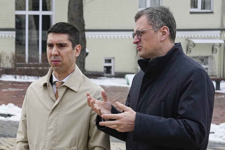 FILE - Ukraine's Foreign Minister Dmytro Kuleba, right, and Moldova's Foreign Minister Mihai Popsoi talk during a flower laying ceremony at the Memory Wall of Fallen Defenders of Ukraine in Kyiv, Ukraine on March. 13, 2024. Since Russia fully invaded Ukraine two years ago, a string of incidents in neighboring Moldova's Russia-backed breakaway region of Transnistria have periodically raised the specter that European Union candidate Moldova could also be in Moscow's crosshairs. (AP Photo/Efrem Lukatsky, File)