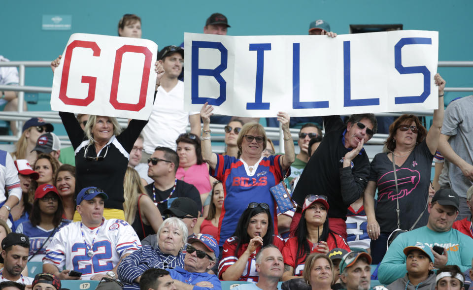 Buffalo Bills fans cheer the team, during the first half of an NFL football game against the Miami Dolphins, Sunday, Dec. 31, 2017, in Miami Gardens, Fla. (AP Photo/Lynne Sladky)