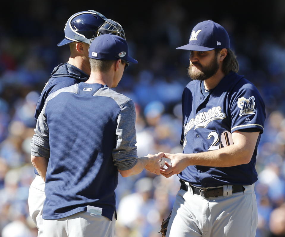 Brewers pitcher Wade Miley (No. 20) is slated to start NLCS Game 6 after starting Game 5 and facing only one batter. (AP)